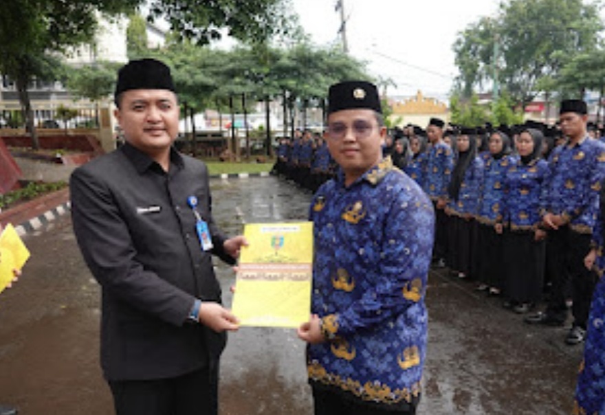 Diguyur Hujan Deras, Disdikbud Lampung Lantik 2514 Guru Honorer Jadi PPPK